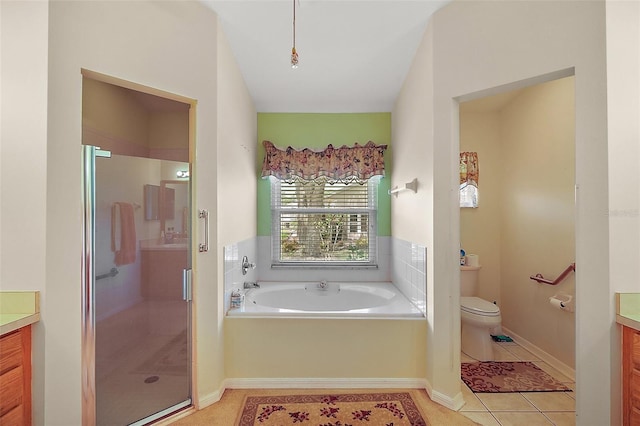 full bath with toilet, a bath, a shower stall, and vanity