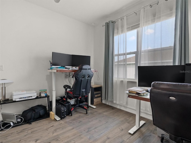 home office featuring wood finished floors