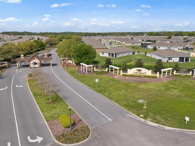 birds eye view of property with a residential view