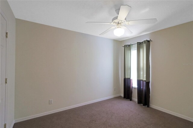 4848 Saint Andrews Arc, Leesburg, FL 34748 - unfurnished room with light colored carpet, ceiling fan, and baseboards