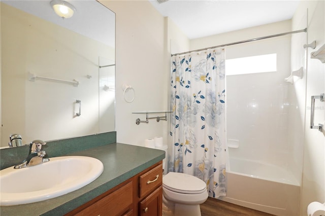 4848 Saint Andrews Arc, Leesburg, FL 34748 - full bath featuring wood finished floors, vanity, toilet, and shower / bath combination with curtain