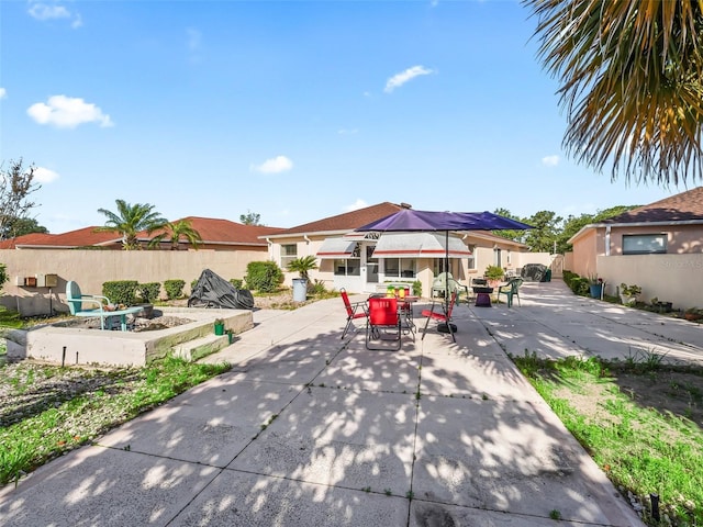 view of patio / terrace with outdoor dining area and a fenced backyard