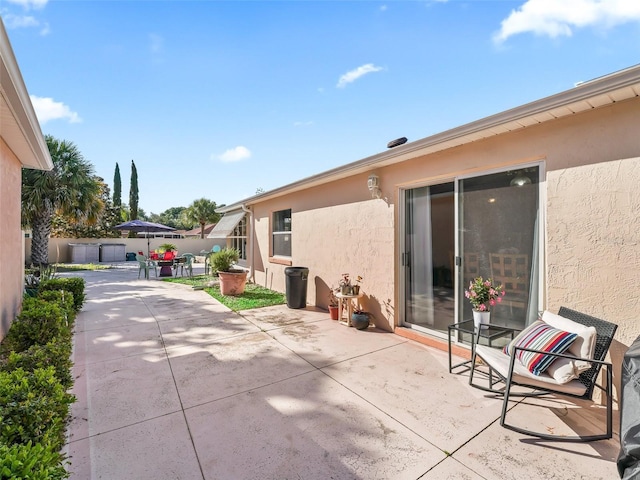 view of patio with fence