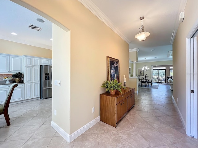 1842 Lake Ridge Dr, The Villages, FL 32162 - hall with baseboards, ornamental molding, light tile patterned flooring, and visible vents