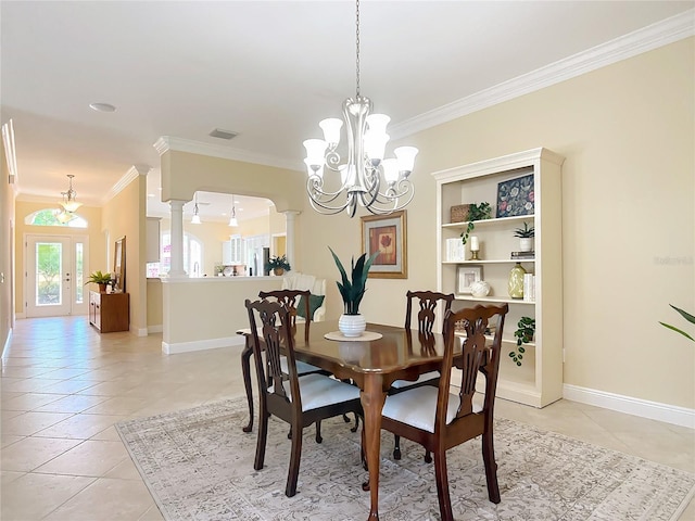 1842 Lake Ridge Dr, The Villages, FL 32162 - dining space featuring crown molding, light tile patterned floors, a notable chandelier, and visible vents