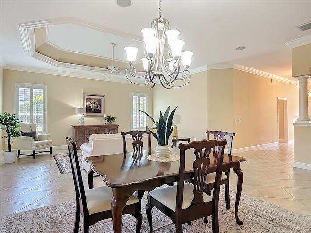 1842 Lake Ridge Dr, The Villages, FL 32162 - dining space with baseboards, ornamental molding, light tile patterned floors, and a tray ceiling