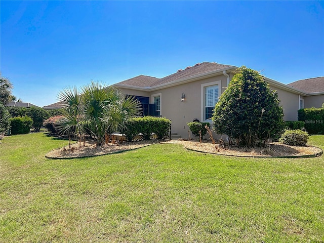 1842 Lake Ridge Dr, The Villages, FL 32162 - view of front of house featuring a front lawn and stucco siding