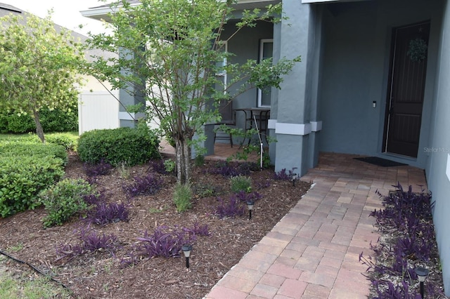 709 Calabria Way, Howey In The Hills, FL 34737 - view of exterior entry with stucco siding