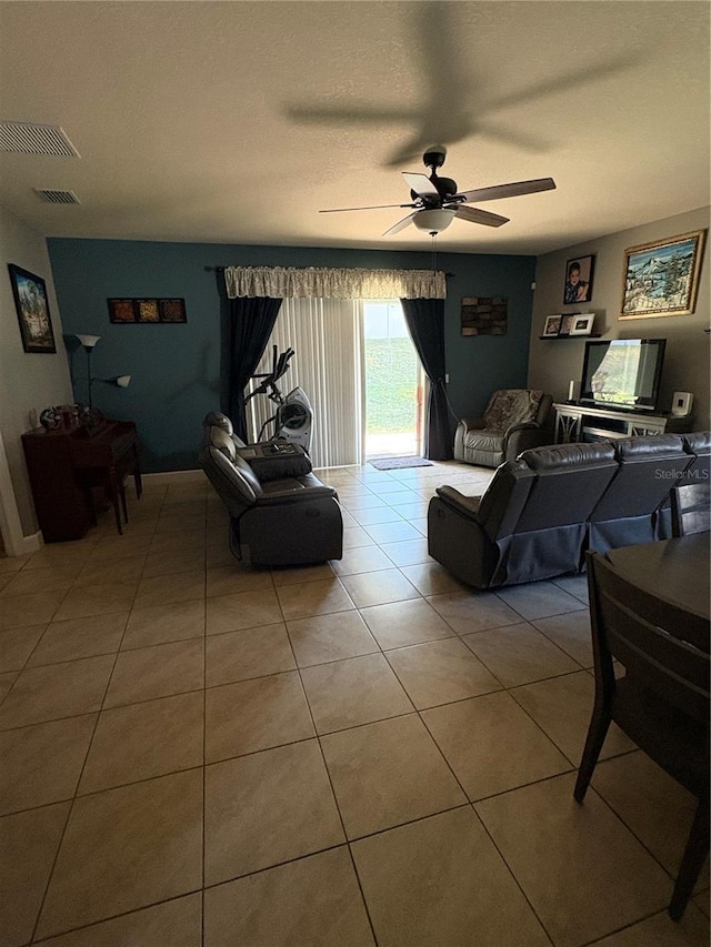 709 Calabria Way, Howey In The Hills, FL 34737 - tiled living area with ceiling fan