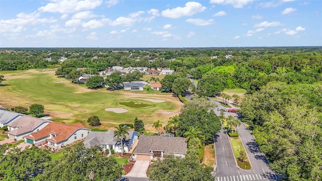 drone / aerial view with a residential view and view of golf course