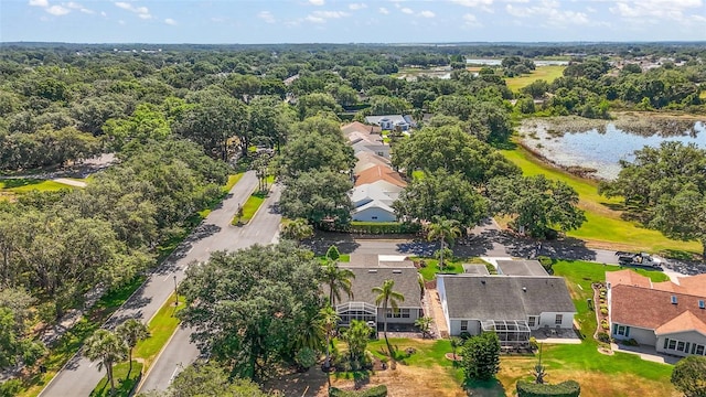 birds eye view of property featuring a water view and a residential view