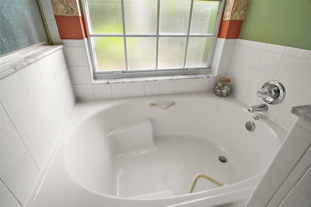 full bath with a bath