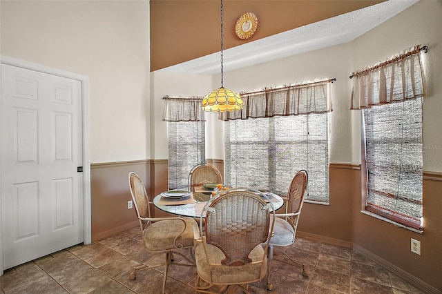 dining space with baseboards