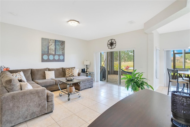 2641 Meadow View Ct, Kissimmee, FL 34746 - living area featuring light tile patterned flooring and baseboards