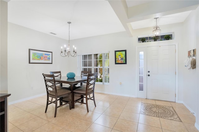 2641 Meadow View Ct, Kissimmee, FL 34746 - dining area featuring a chandelier and light tile patterned flooring