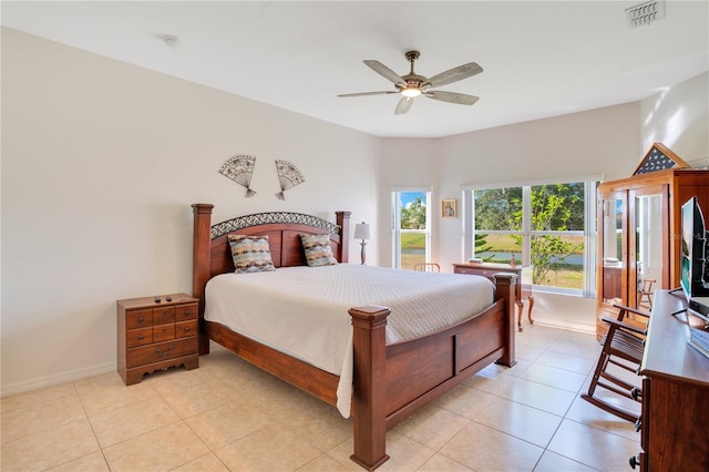 2641 Meadow View Ct, Kissimmee, FL 34746 - bedroom featuring light tile patterned floors and ceiling fan