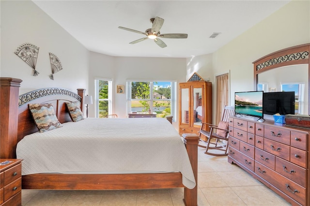 2641 Meadow View Ct, Kissimmee, FL 34746 - bedroom with ceiling fan and light tile patterned floors