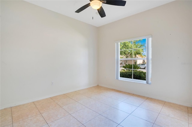 2641 Meadow View Ct, Kissimmee, FL 34746 - empty room with ceiling fan and light tile patterned floors