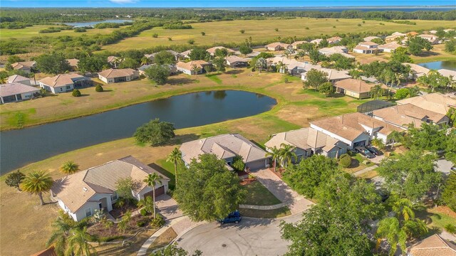 2641 Meadow View Ct, Kissimmee, FL 34746 - aerial overview of property's location featuring nearby suburban area and a large body of water
