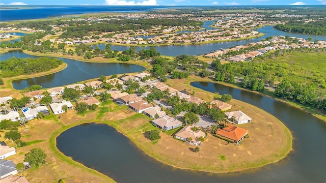2641 Meadow View Ct, Kissimmee, FL 34746 - aerial view of property and surrounding area featuring nearby suburban area and a large body of water