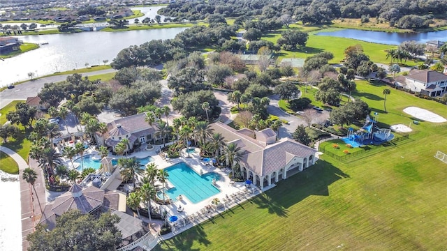 2641 Meadow View Ct, Kissimmee, FL 34746 - aerial perspective of suburban area featuring a large body of water and a pool