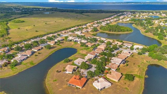 2641 Meadow View Ct, Kissimmee, FL 34746 - aerial overview of property's location with nearby suburban area and a nearby body of water
