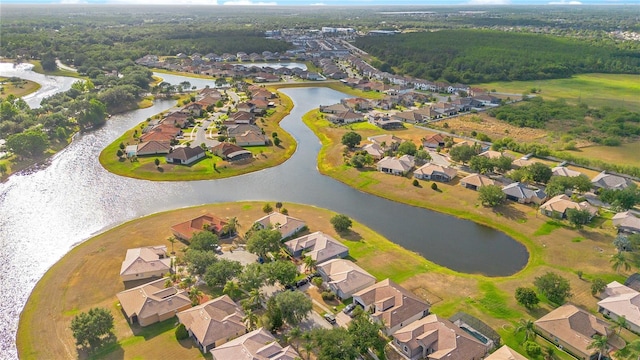 2641 Meadow View Ct, Kissimmee, FL 34746 - aerial view of property's location with nearby suburban area and a nearby body of water