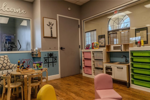 2641 Meadow View Ct, Kissimmee, FL 34746 - rec room with a sink and wood finished floors