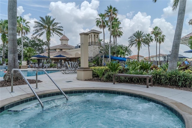 2641 Meadow View Ct, Kissimmee, FL 34746 - community pool featuring a patio area and a community hot tub
