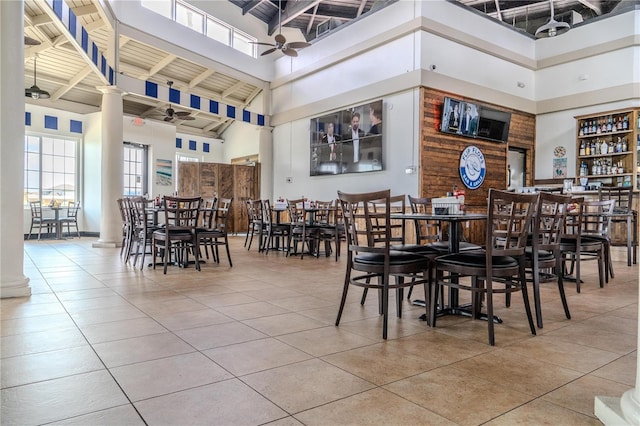 2641 Meadow View Ct, Kissimmee, FL 34746 - tiled dining space with a high ceiling and a ceiling fan