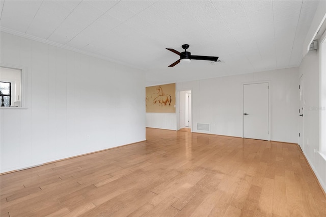 274 W Kings Hwy, Center Hill, FL 33514 - unfurnished room featuring a ceiling fan, visible vents, ornamental molding, and light wood-style flooring