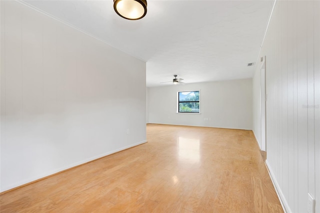 274 W Kings Hwy, Center Hill, FL 33514 - unfurnished room with baseboards, visible vents, ceiling fan, and light wood-style floors