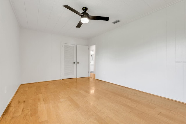 274 W Kings Hwy, Center Hill, FL 33514 - spare room featuring light wood-style floors, ceiling fan, and visible vents