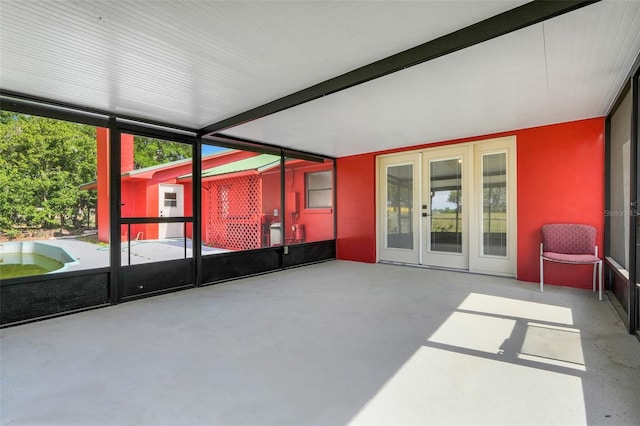 274 W Kings Hwy, Center Hill, FL 33514 - unfurnished sunroom with beamed ceiling and french doors
