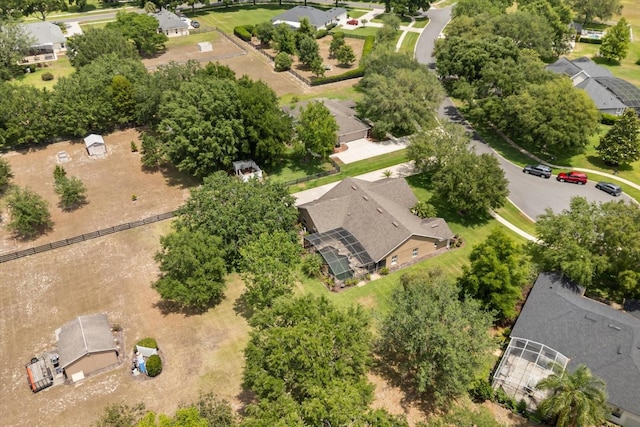 birds eye view of property with a residential view