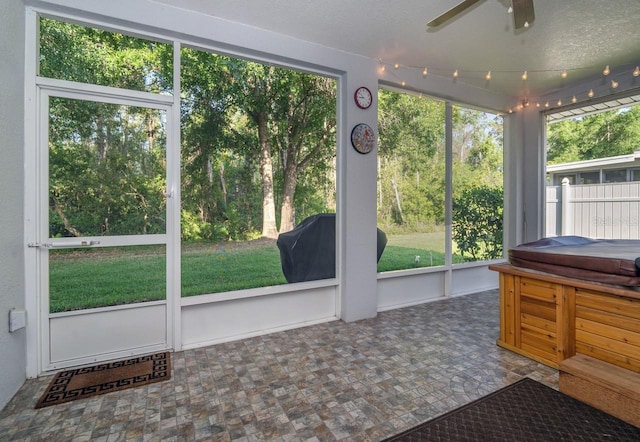2539 Caithness Way, Clermont, FL 34714 - sunroom featuring ceiling fan and a jacuzzi