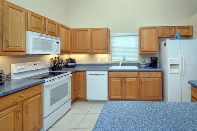 2539 Caithness Way, Clermont, FL 34714 - kitchen with white appliances, a sink, dark countertops, light tile patterned floors, and a high ceiling