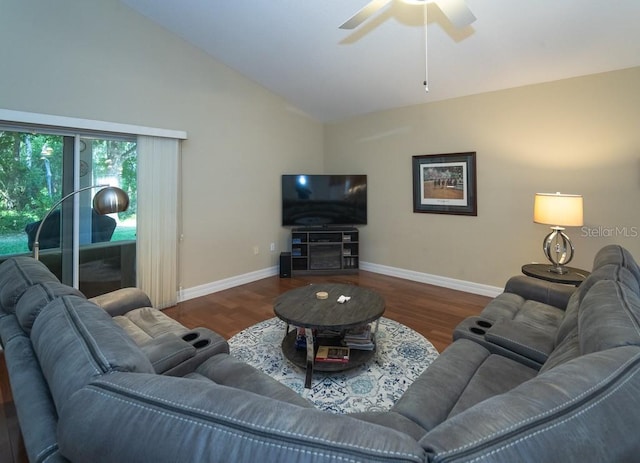2539 Caithness Way, Clermont, FL 34714 - living room with baseboards, wood finished floors, ceiling fan, and high vaulted ceiling