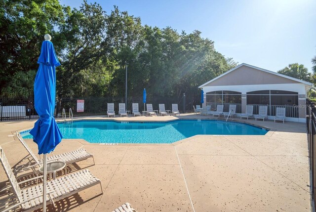 2539 Caithness Way, Clermont, FL 34714 - community pool with a patio