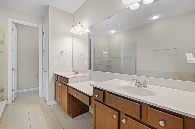 full bath featuring vanity, tile patterned floors, a shower stall, and toilet