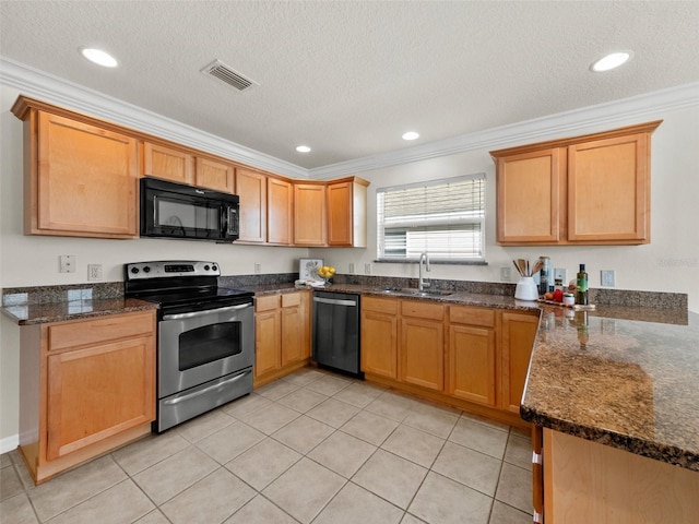 951 Chapman Loop, The Villages, FL 32162 - kitchen with black microwave, electric range, dishwashing machine, a sink, and crown molding
