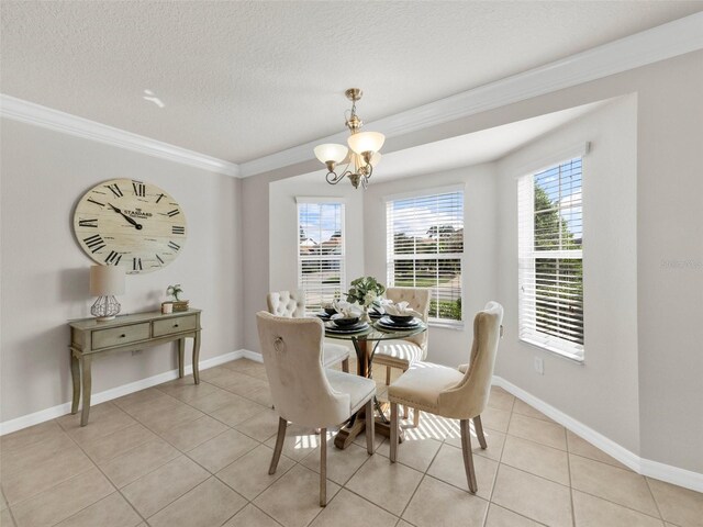 951 Chapman Loop, The Villages, FL 32162 - dining area featuring a chandelier, crown molding, light tile patterned flooring, plenty of natural light, and a textured ceiling