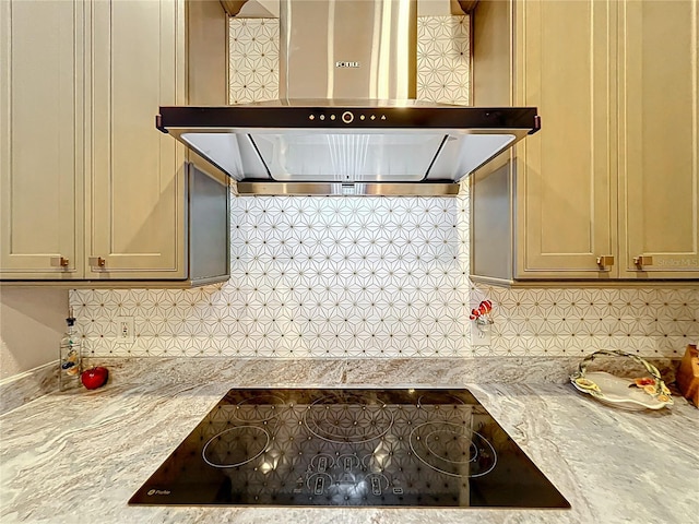 1473 Lakemist Ln, Clermont, FL 34711 - kitchen featuring backsplash, black electric cooktop, and ventilation hood