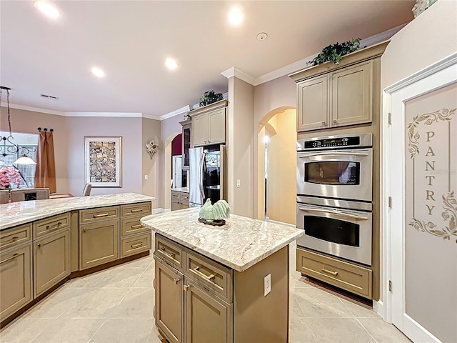 1473 Lakemist Ln, Clermont, FL 34711 - kitchen featuring crown molding, arched walkways, smart refrigerator, a center island, and double oven