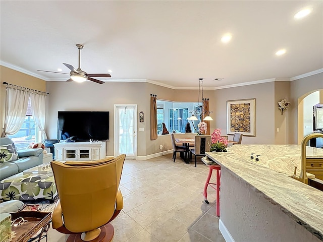 1473 Lakemist Ln, Clermont, FL 34711 - living room featuring arched walkways, ceiling fan, baseboards, and recessed lighting