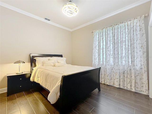 1473 Lakemist Ln, Clermont, FL 34711 - bedroom with wood finish floors, visible vents, ornamental molding, and baseboards