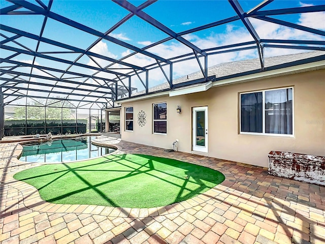 1473 Lakemist Ln, Clermont, FL 34711 - back of house with a lanai, a patio, stucco siding, and an outdoor pool