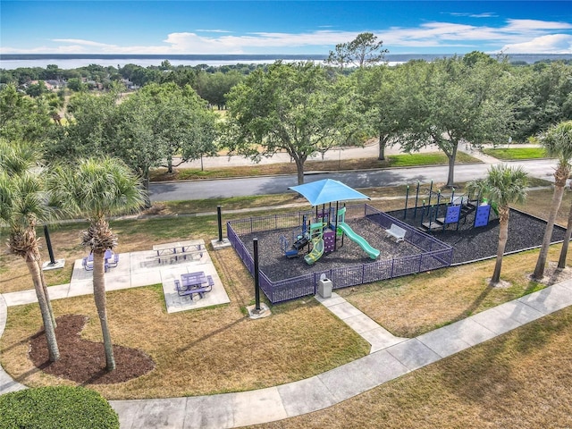 1473 Lakemist Ln, Clermont, FL 34711 - view of home's community with a lawn, fence, and playground community