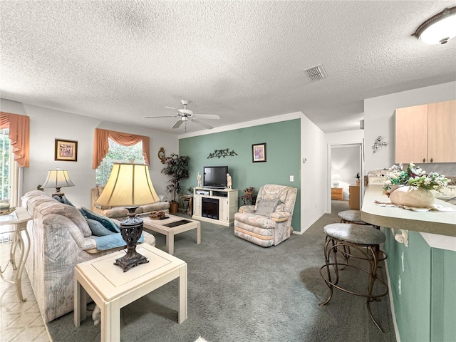 2102 Estevez Dr, Lady Lake, FL 32159 - carpeted living area with a ceiling fan and a textured ceiling