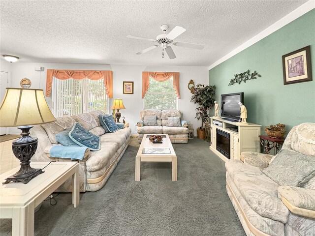 2102 Estevez Dr, Lady Lake, FL 32159 - carpeted living room with a textured ceiling and ceiling fan